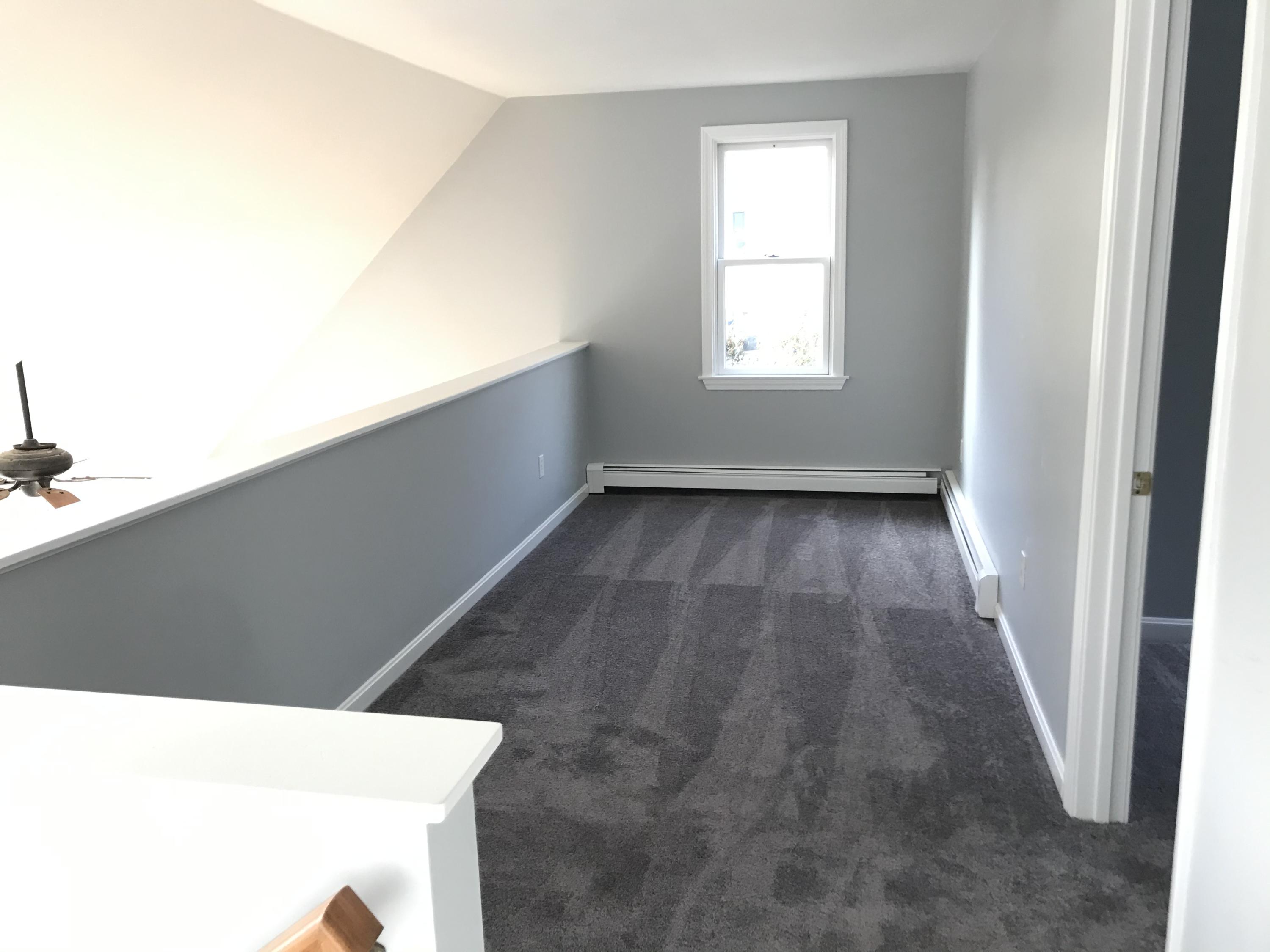 57 Deer Ridge Road Mashpee, MA 02649 - Photo 10 of 18 a view of an empty room and window