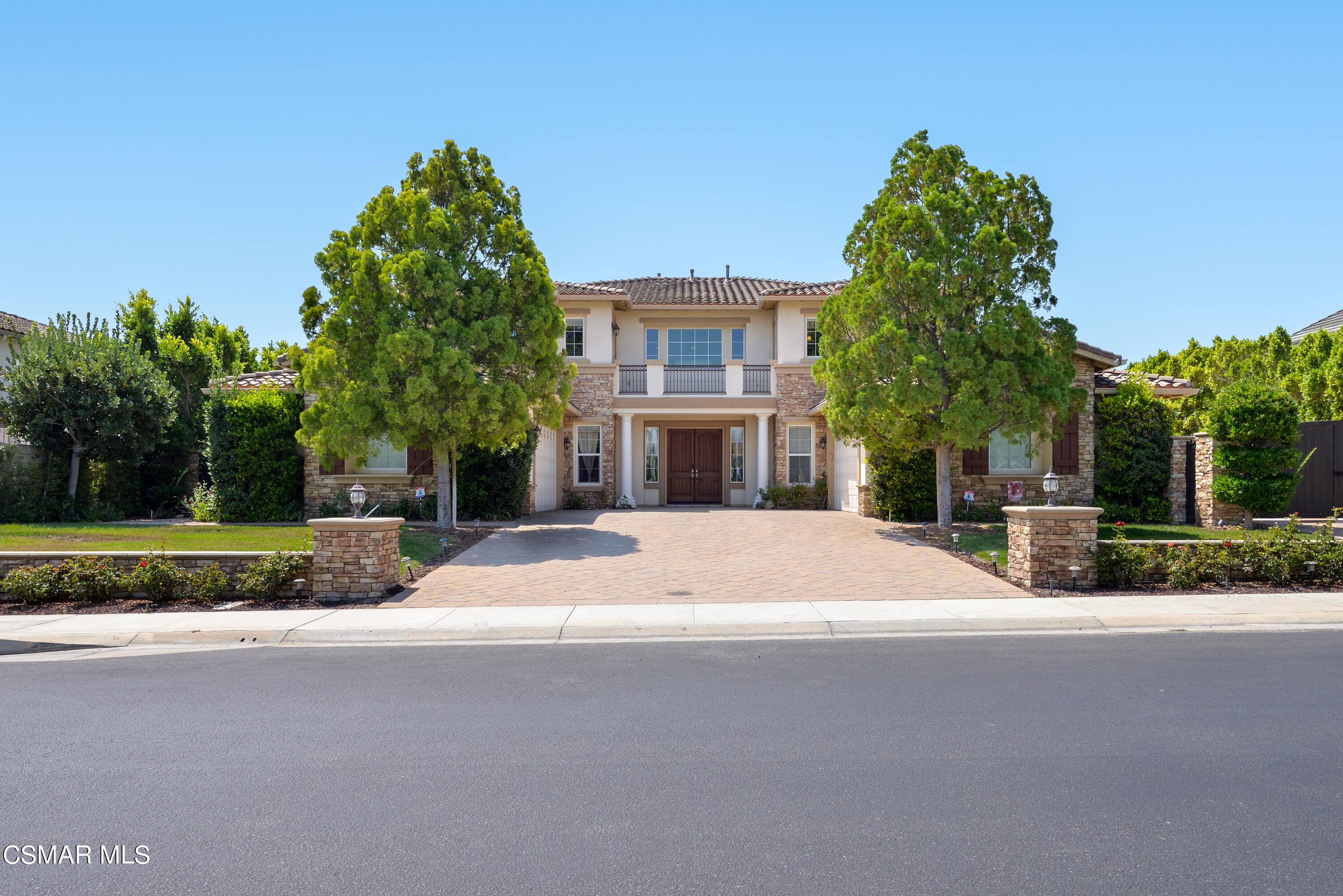 12442 Nelson Road Moorpark, CA 93021 - Photo 1 of 83 a front view of a house with a yard and palm trees