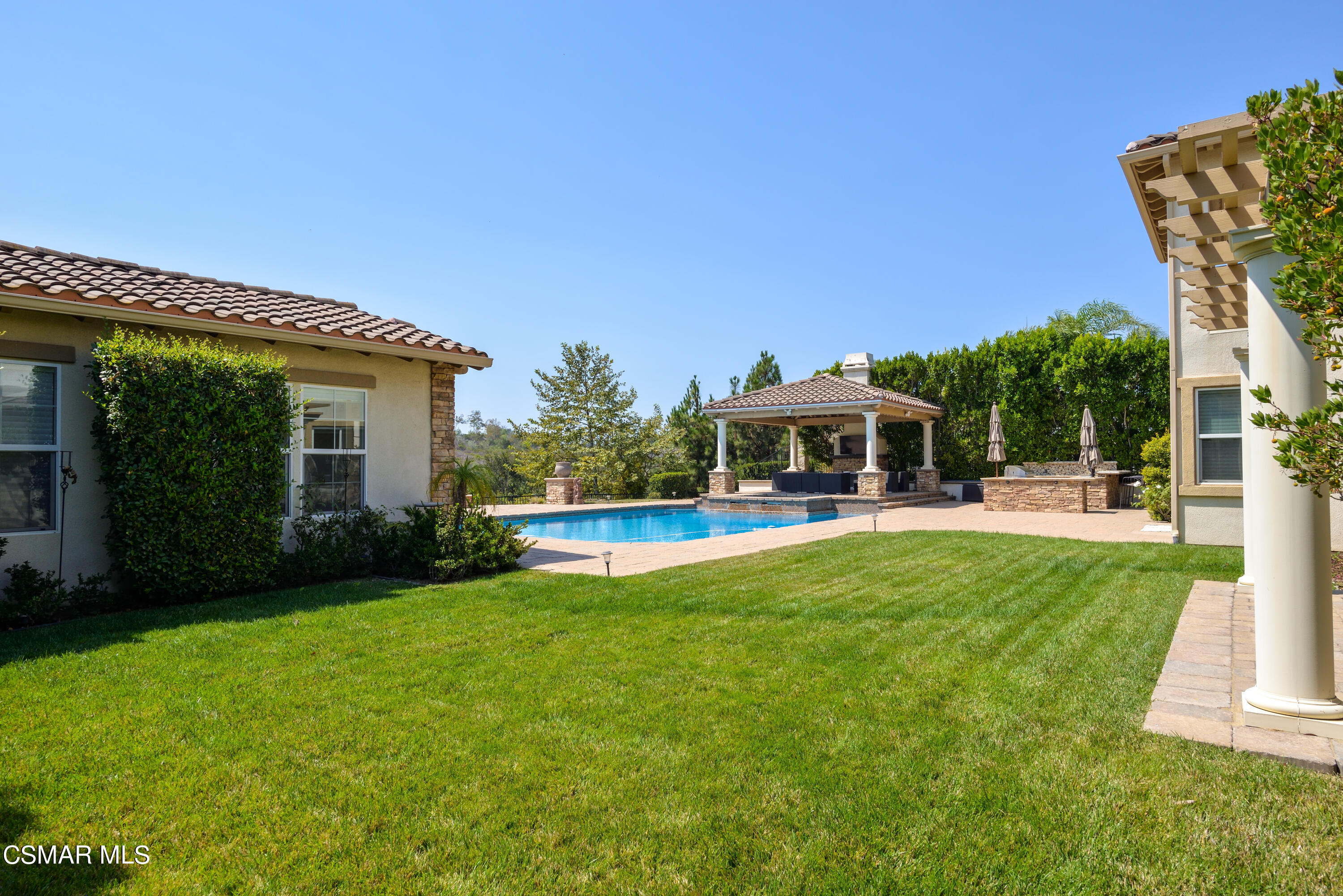 12442 Nelson Road Moorpark, CA 93021 - Photo 23 of 83 a house view with a sitting space and garden