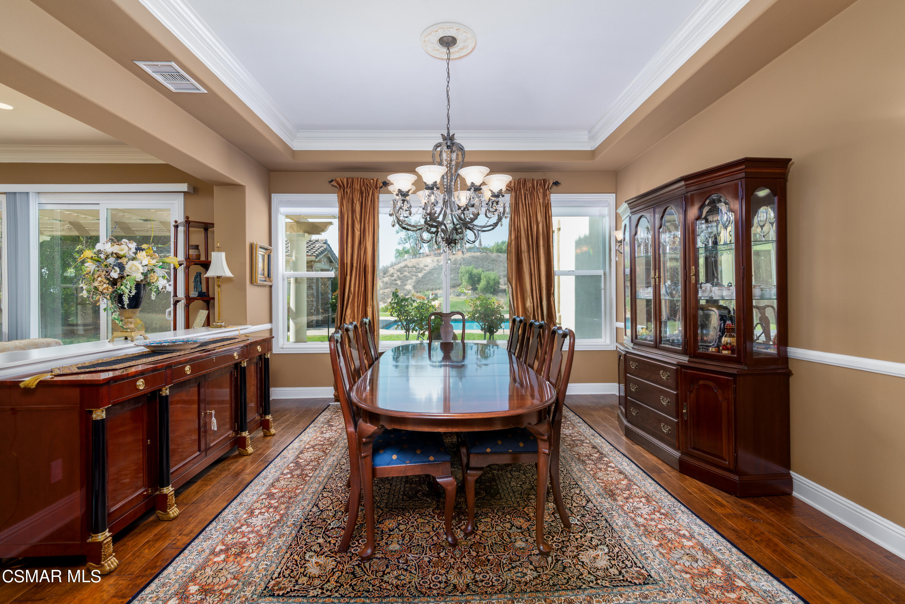 12442 Nelson Road Moorpark, CA 93021 - Photo 32 of 83 a view of a dining room with furniture window and wooden floor