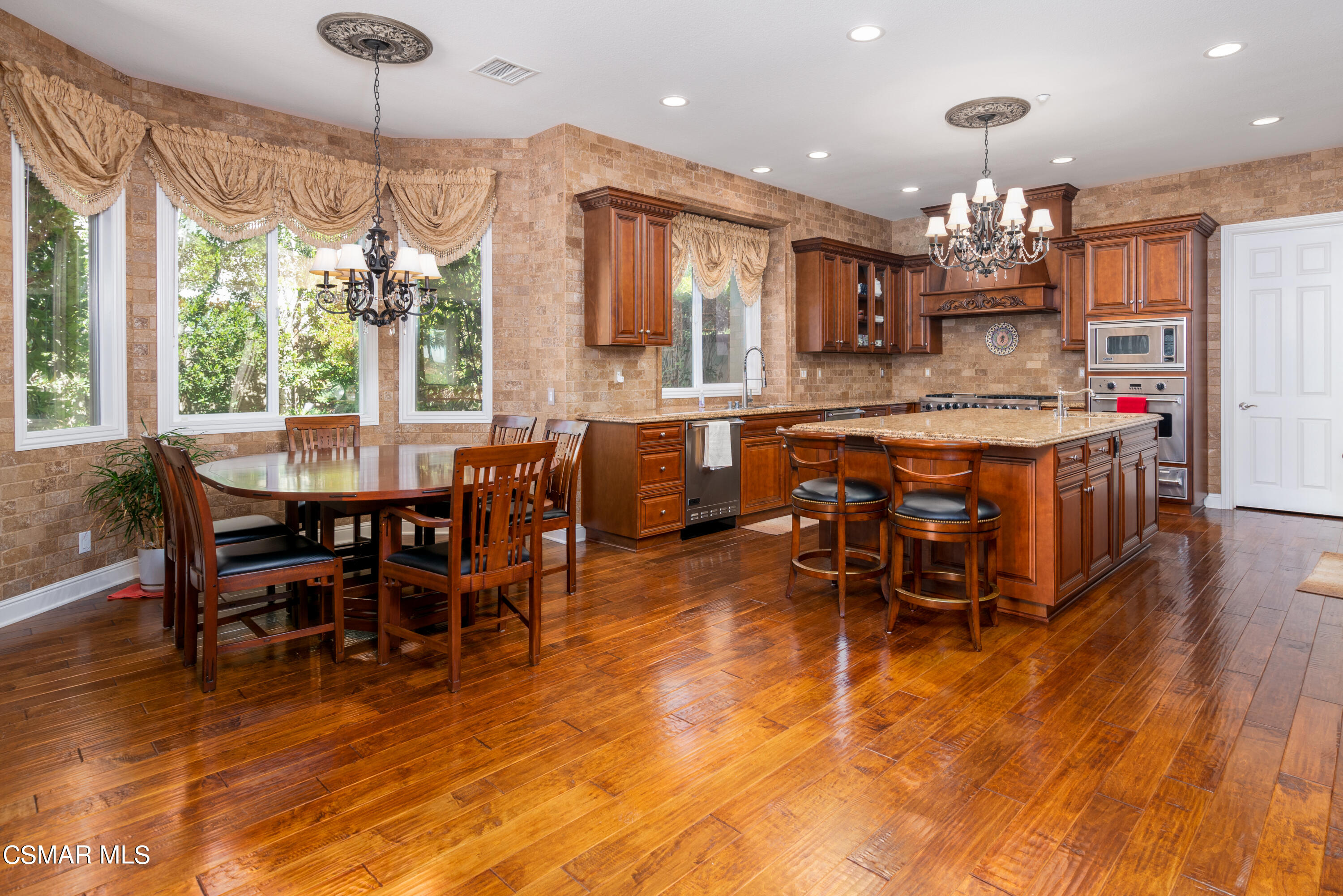 12442 Nelson Road Moorpark, CA 93021 - Photo 37 of 83 a view of a dining room with furniture window and wooden floor