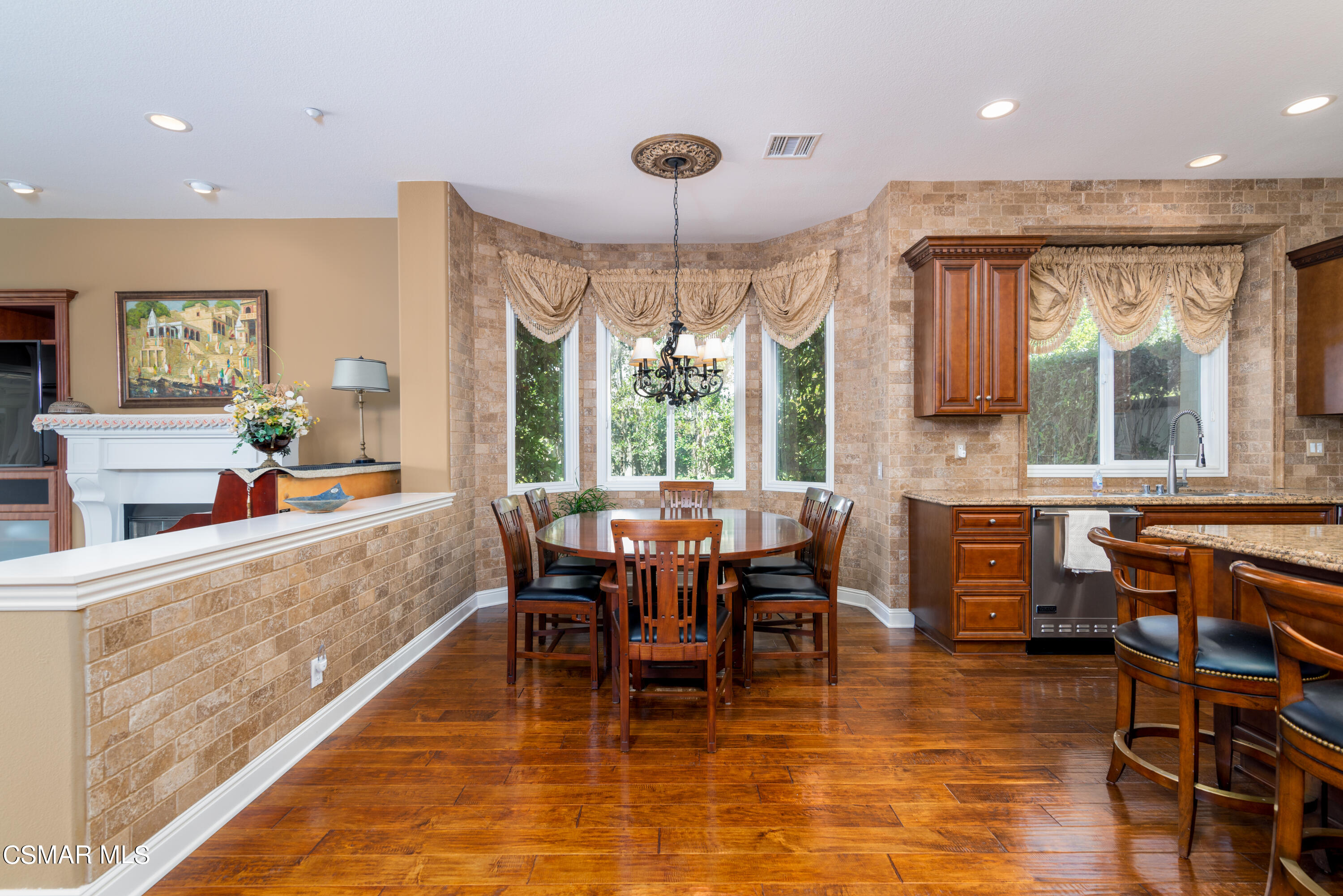 12442 Nelson Road Moorpark, CA 93021 - Photo 38 of 83 a view of a dining room with furniture window and wooden floor