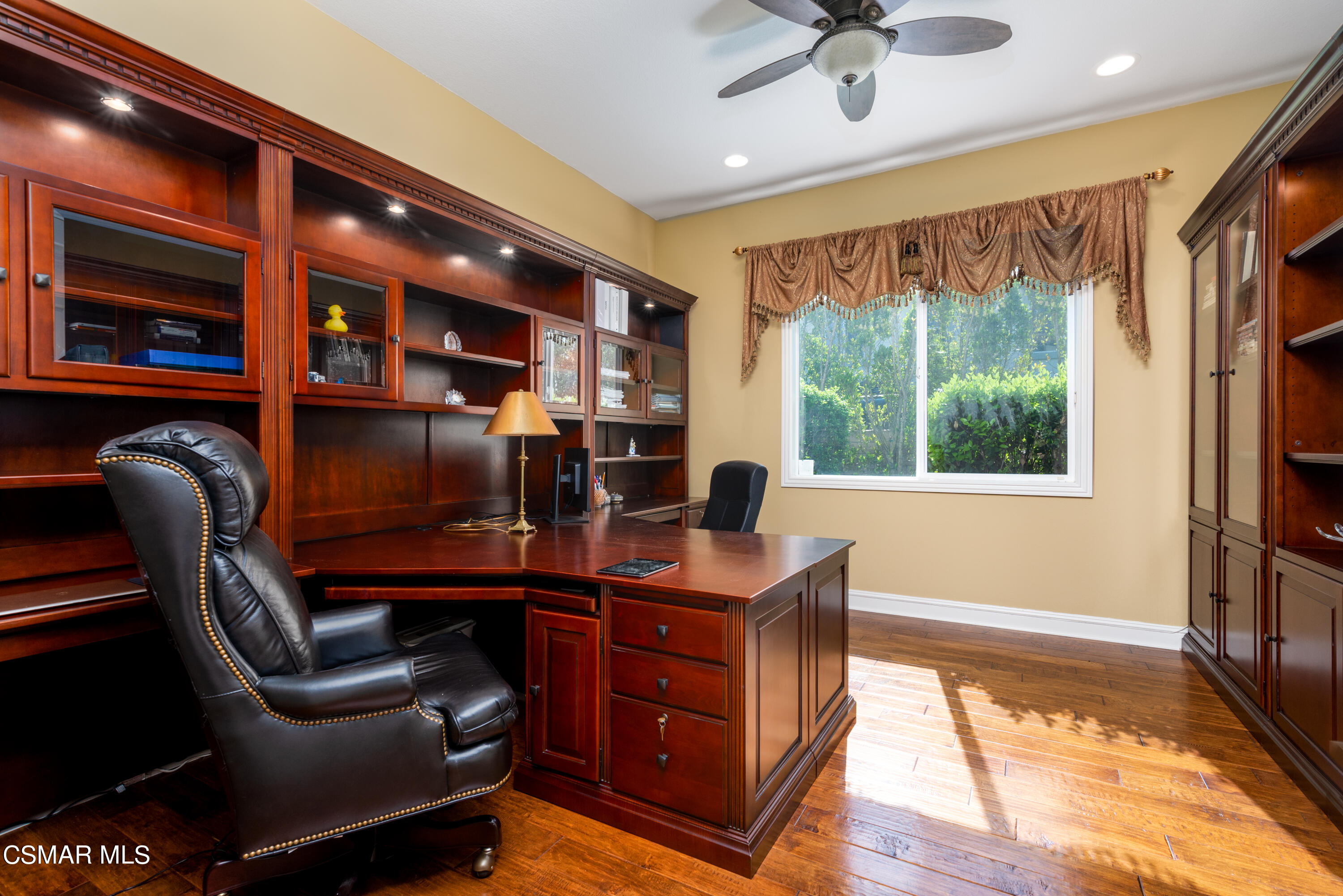 12442 Nelson Road Moorpark, CA 93021 - Photo 45 of 83 a view of a workspace with furniture and a window