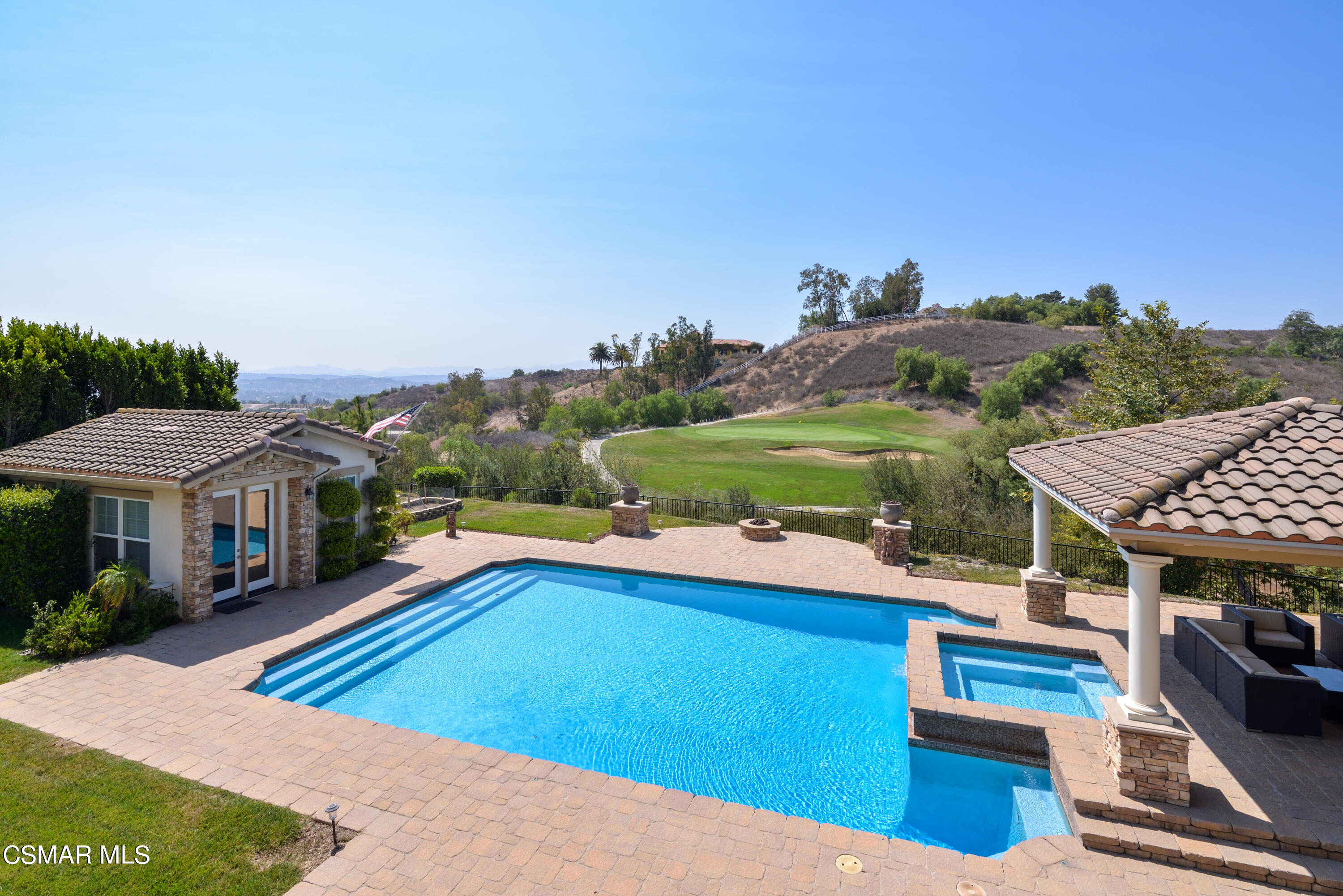 12442 Nelson Road Moorpark, CA 93021 - Photo 52 of 83 a view of a house with pool and a yard