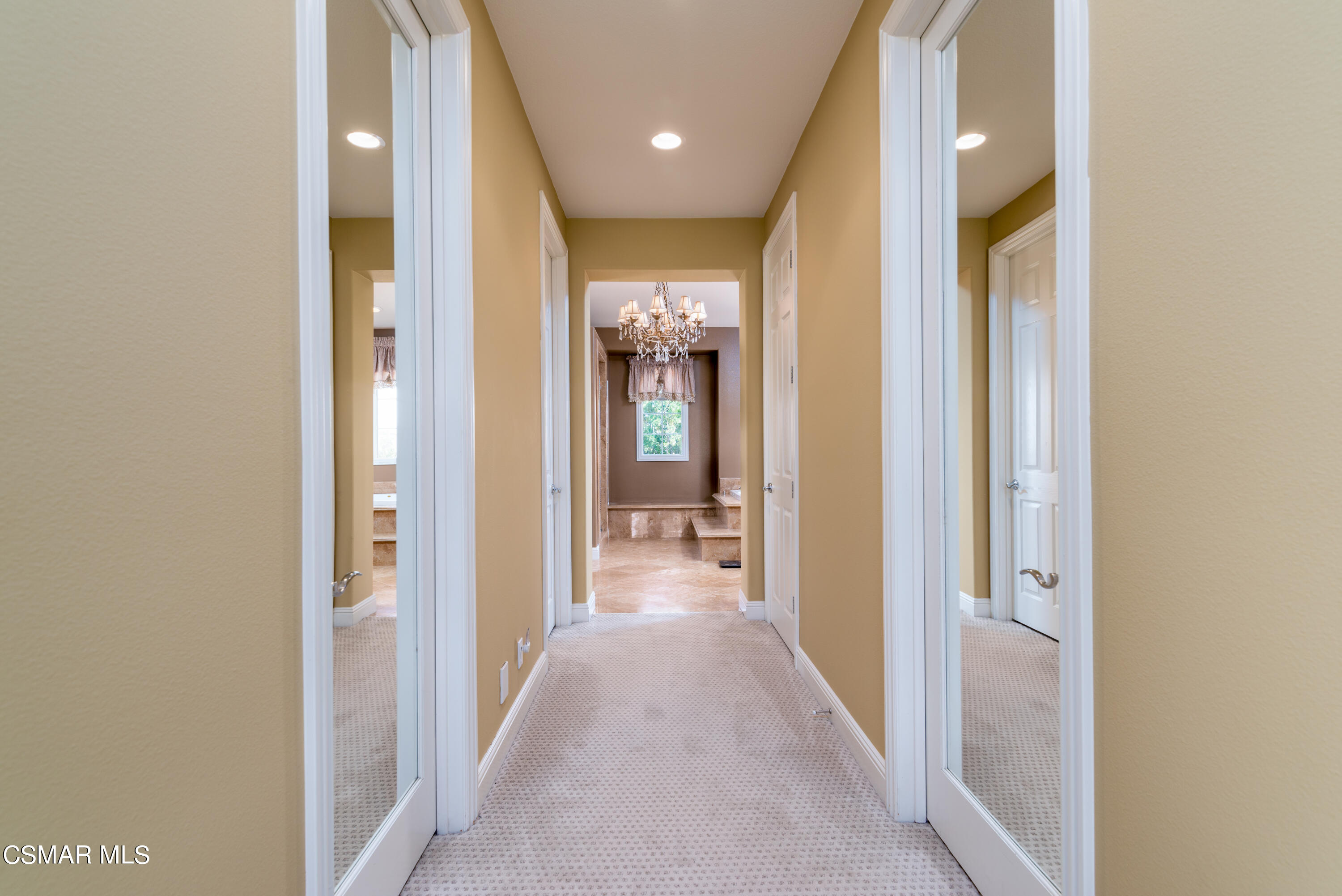 12442 Nelson Road Moorpark, CA 93021 - Photo 53 of 83 a view of a hallway with wooden floor