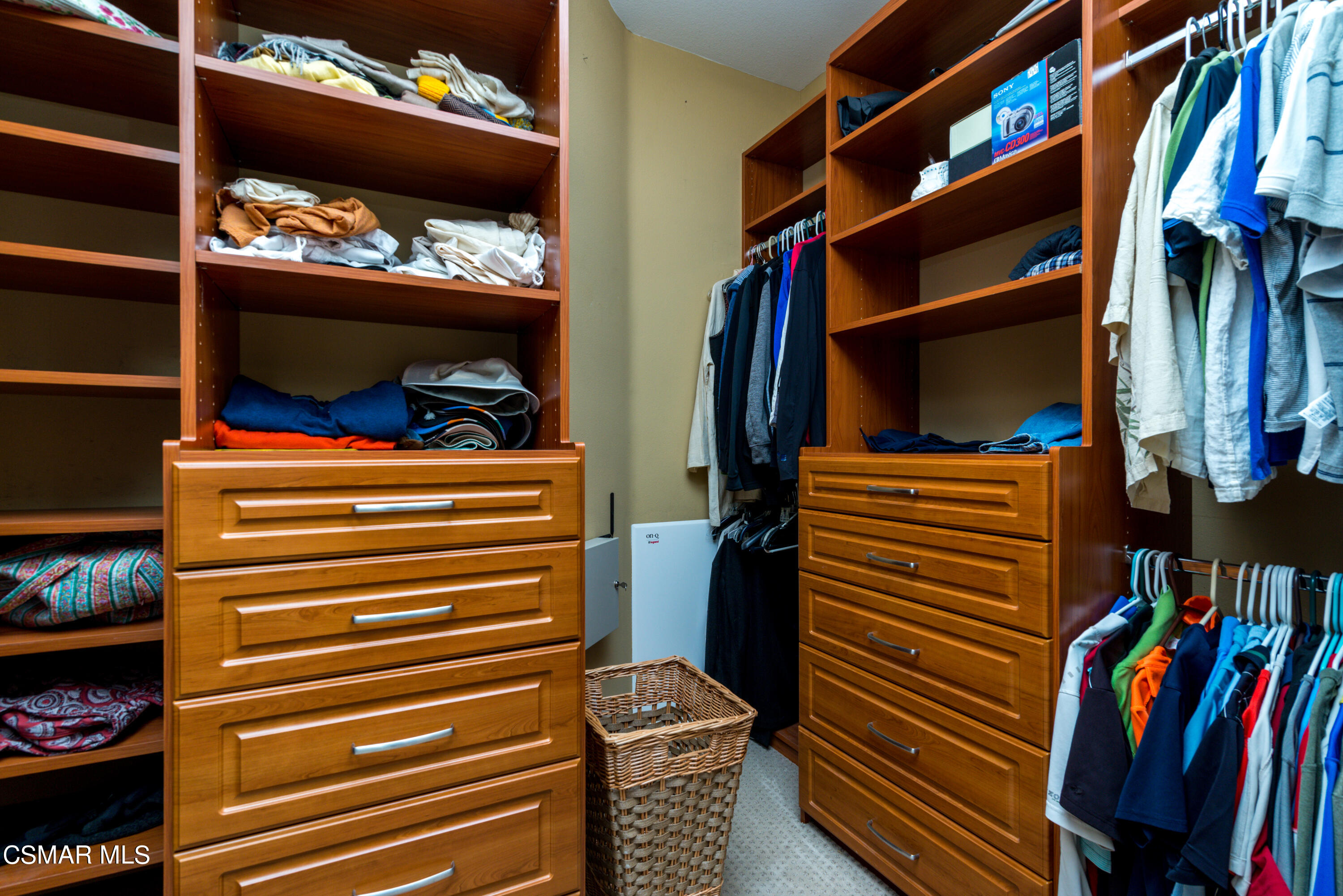 12442 Nelson Road Moorpark, CA 93021 - Photo 55 of 83 a view of walk in closet and clothes