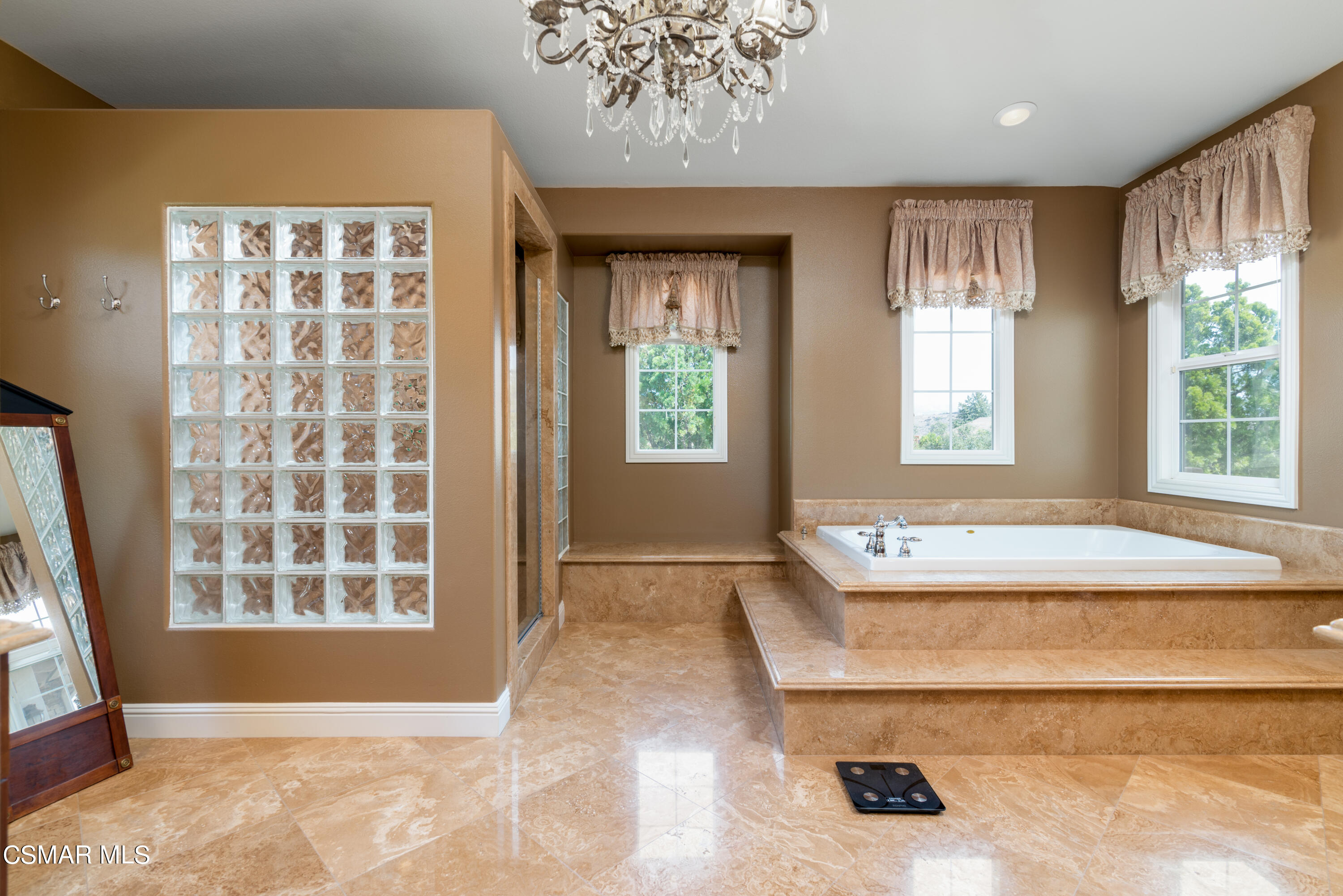 12442 Nelson Road Moorpark, CA 93021 - Photo 56 of 83 a spacious bathroom with a tub and sink