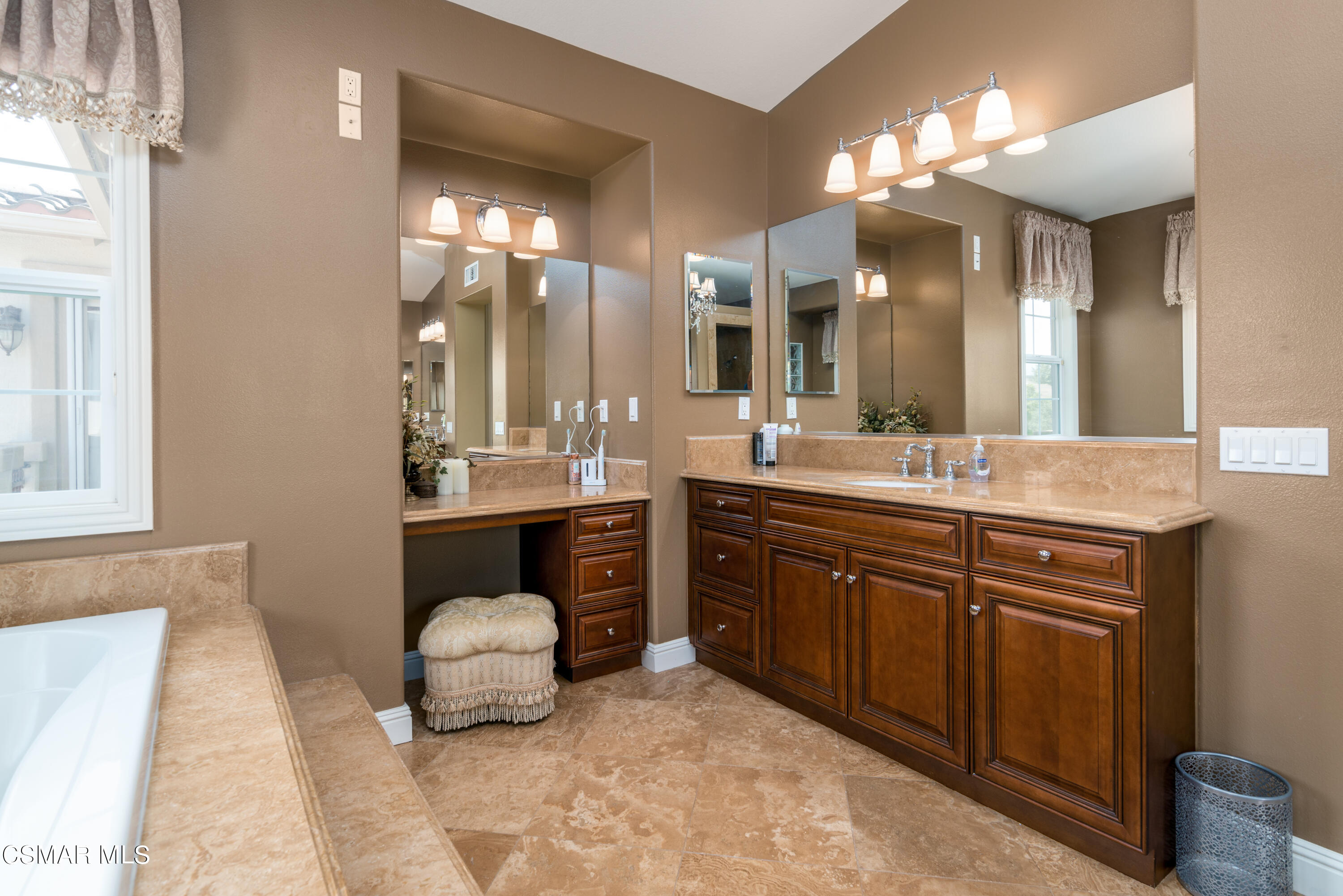 12442 Nelson Road Moorpark, CA 93021 - Photo 57 of 83 a bathroom with a sink double vanity and a mirror