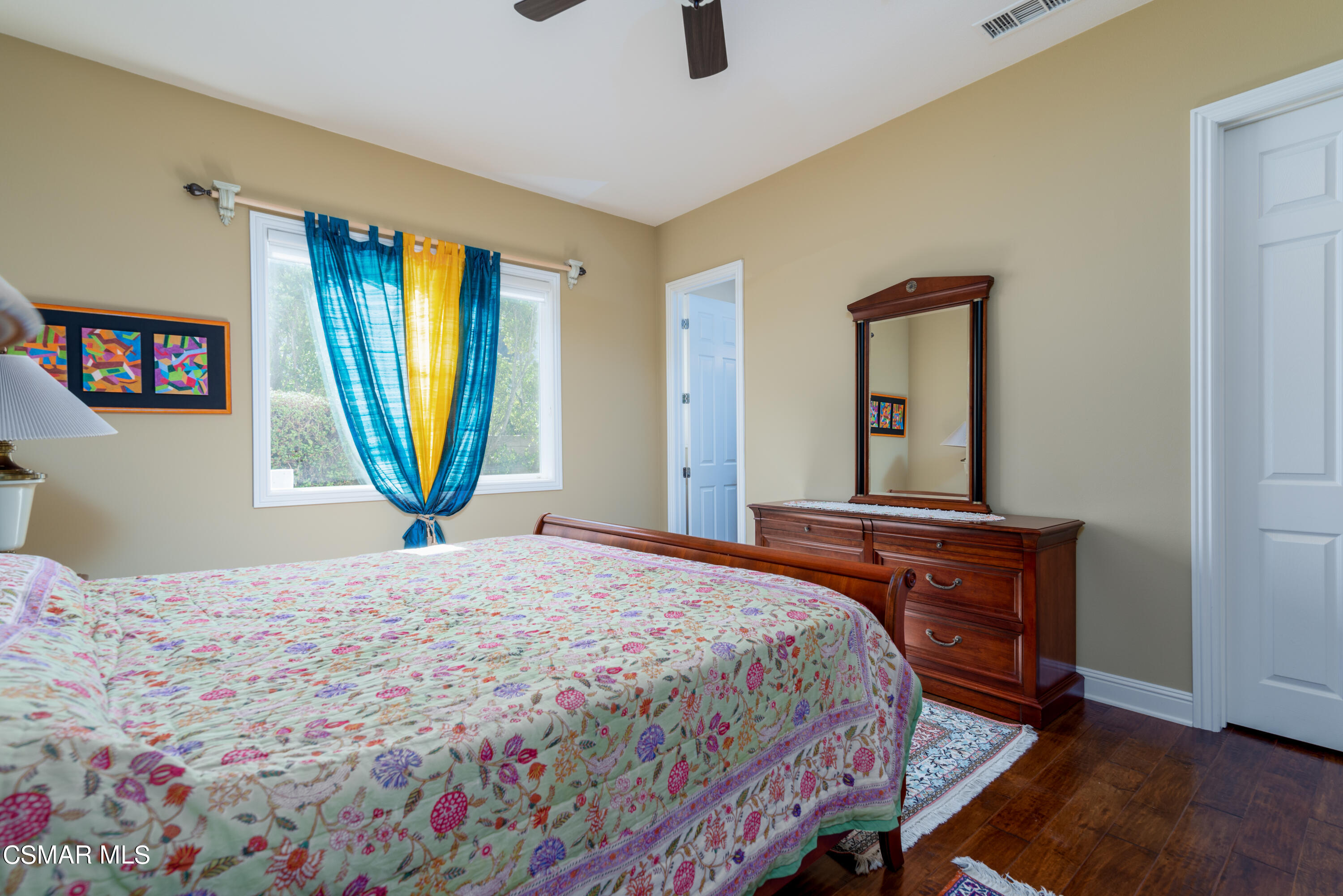 12442 Nelson Road Moorpark, CA 93021 - Photo 64 of 83 a bedroom with a bed and a mirror