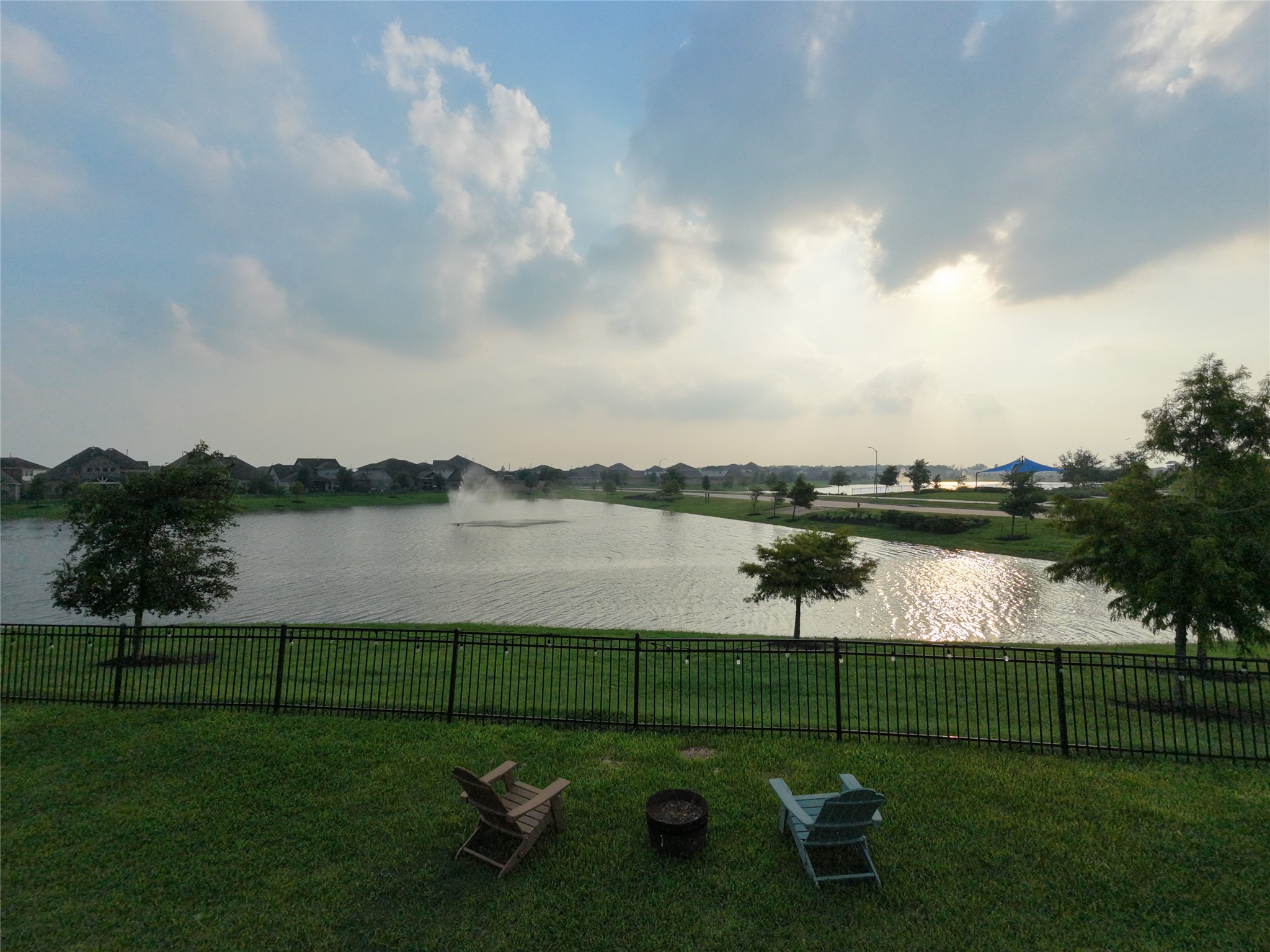 10142 Whitney Reach Drive Rosharon, TX 77583 - Photo 22 of 26 a view of a lake with outdoor space