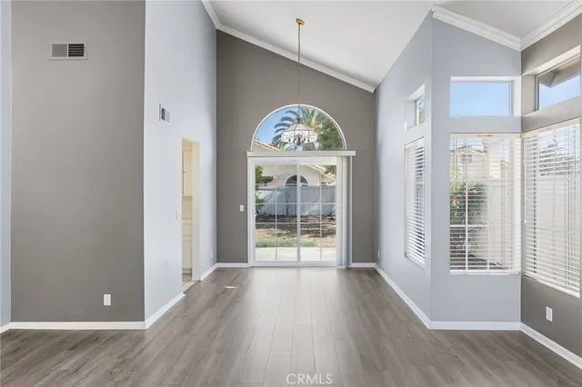 a kitchen with stainless steel appliances a stove a sink and a refrigerator