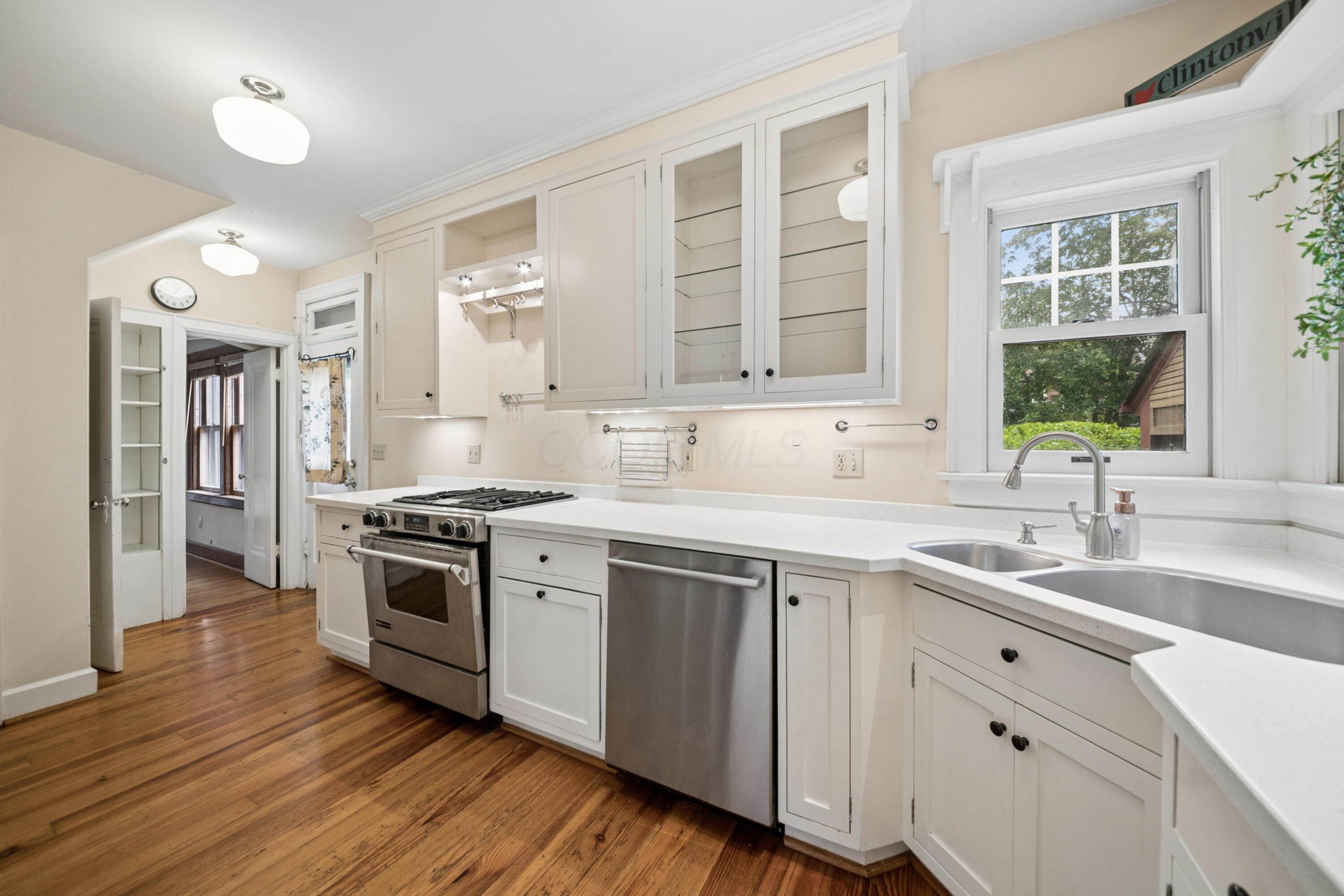 393 Mimring Road Columbus, OH 43202 - Photo 26 of 55 Gorgeous kitchen with plenty of counter space and lots of light--notice the pantry closet!