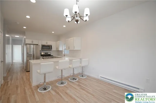 a view of kitchen with breakfast area