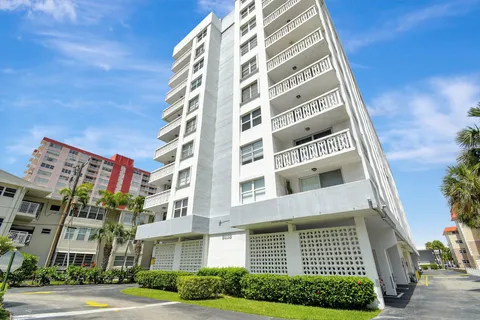 a car parked in front of a building