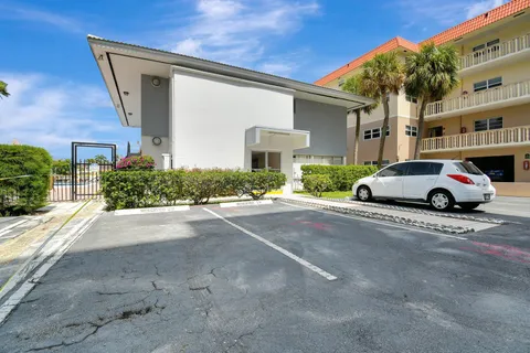 a view of outdoor space with swimming pool and sitting area