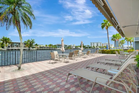 a view of a lake with a building in the background