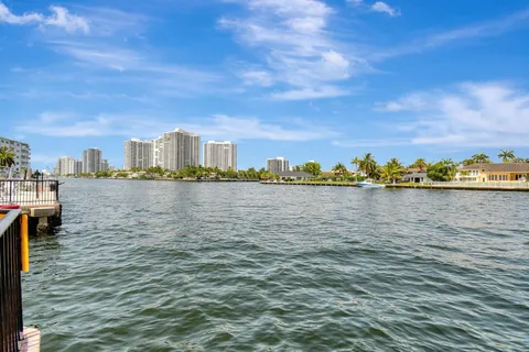 a bathroom with a sink toilet and a shower