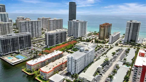 a view of a city with tall buildings