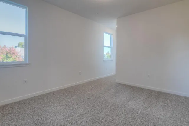 an empty room with windows