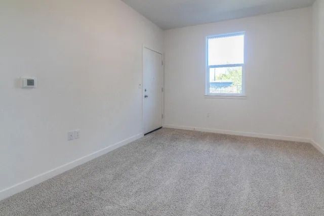 an empty room with a window