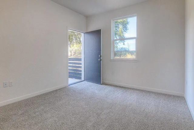 an empty room with windows