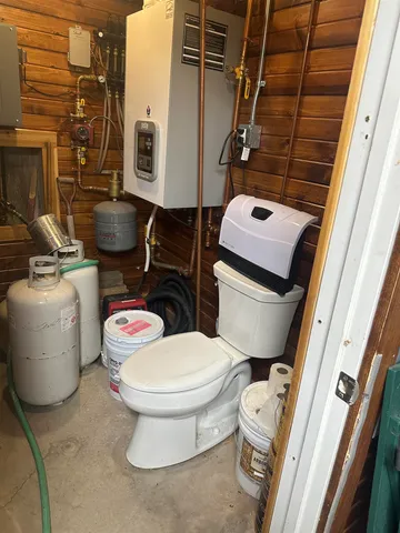 a kitchen with a stove and cabinets