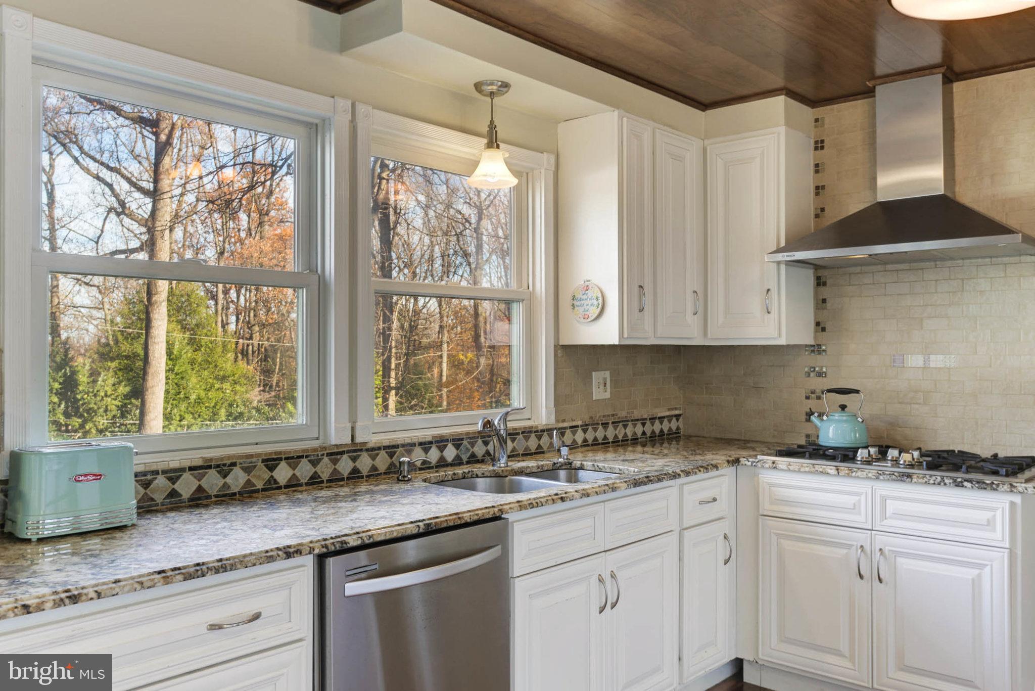648 Shore Acres Road Arnold, MD 21012 - Photo 11 of 60 Large Window Overlooking In Ground Pool