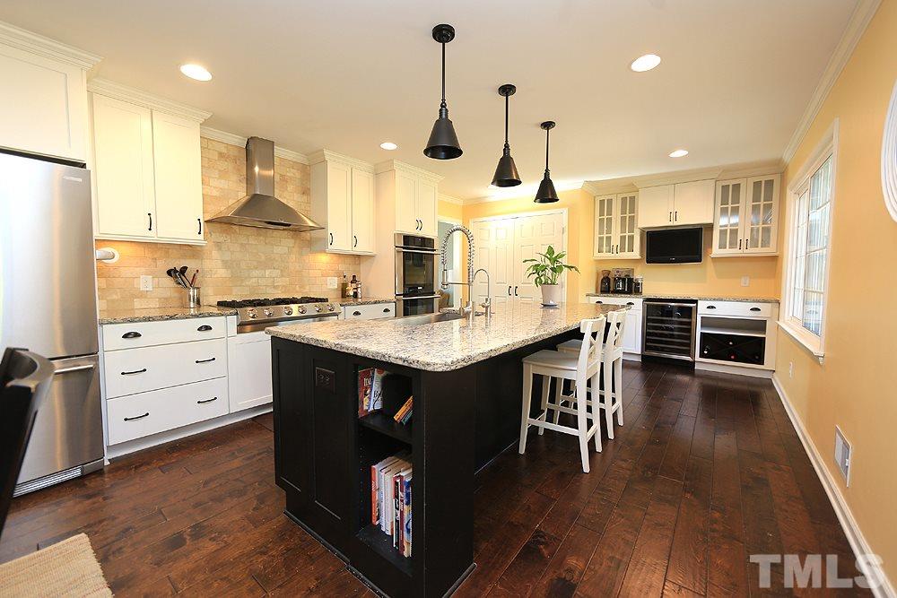 4305 Oak Park Road Raleigh, NC 27612 - Photo 3 of 18 Completely renovated kitchen with Gas Stove & Double ovens. Peninsula with Cook Book Nook and a butler's pantry/coffee spot!