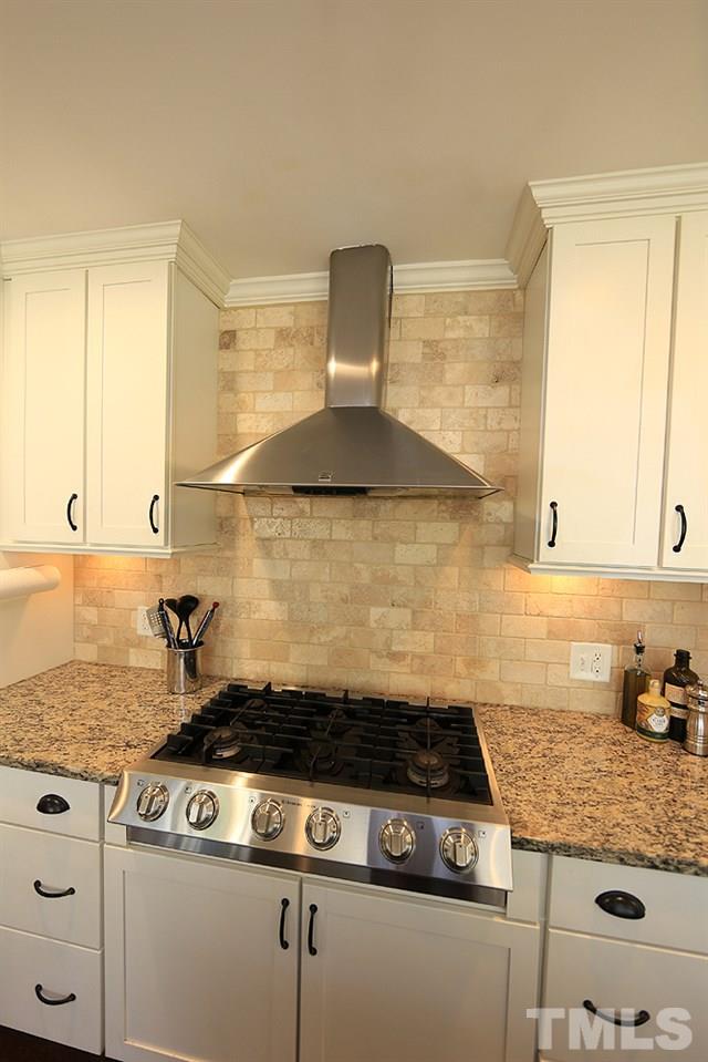 4305 Oak Park Road Raleigh, NC 27612 - Photo 8 of 18 Rockin' 6 burner Gas Stove. ( This is what I want in my house!) Oh, you can have it for your very own!