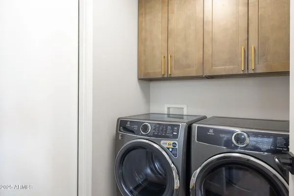 a kitchen with a stove microwave and refrigerator