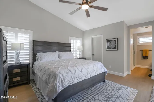 a bedroom with a bed and a dresser