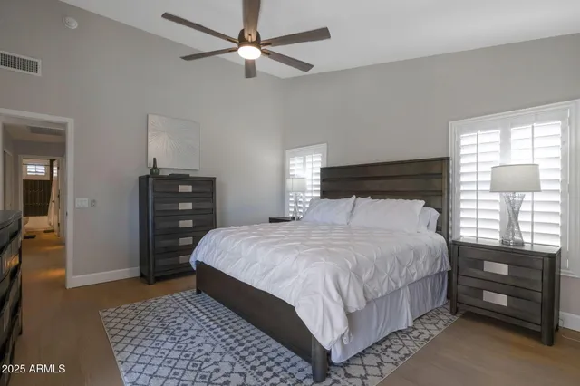 a bedroom with a bed and a walk in closet