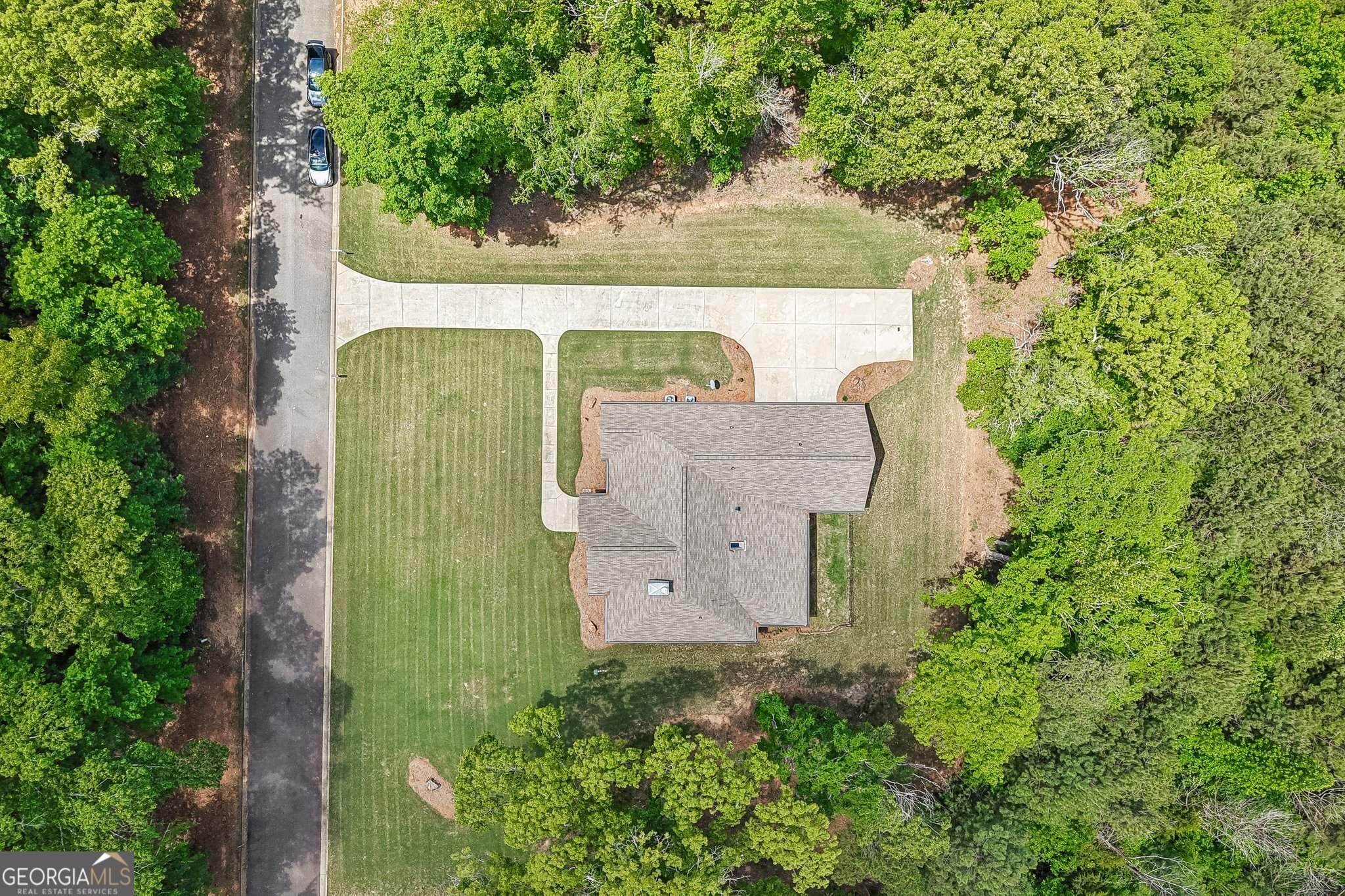 108 Wilderness Way Jackson, GA 30233 - Photo 24 of 31 an aerial view of a house with a yard and garden