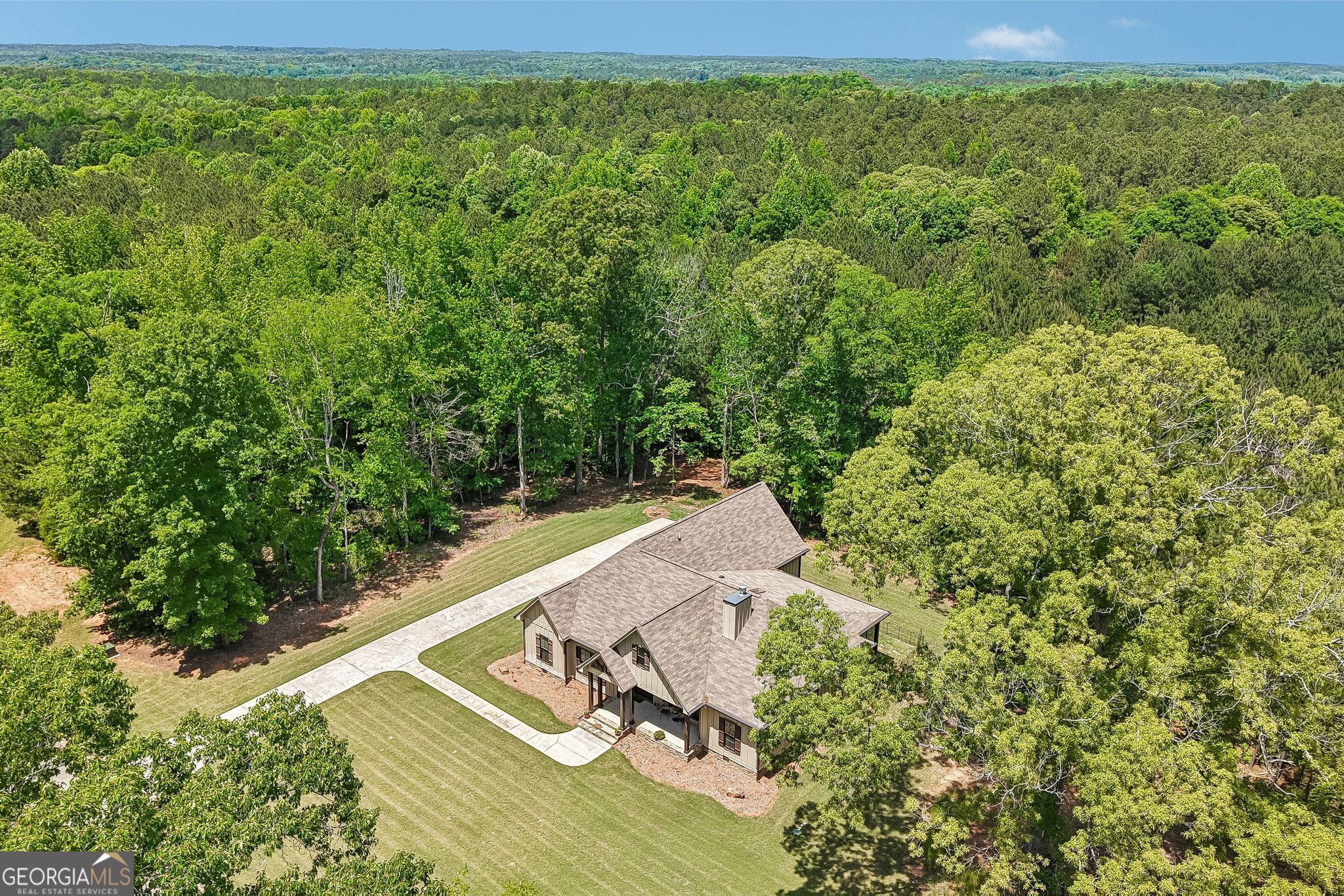 108 Wilderness Way Jackson, GA 30233 - Photo 27 of 31 a view of a yard with an outdoor seating