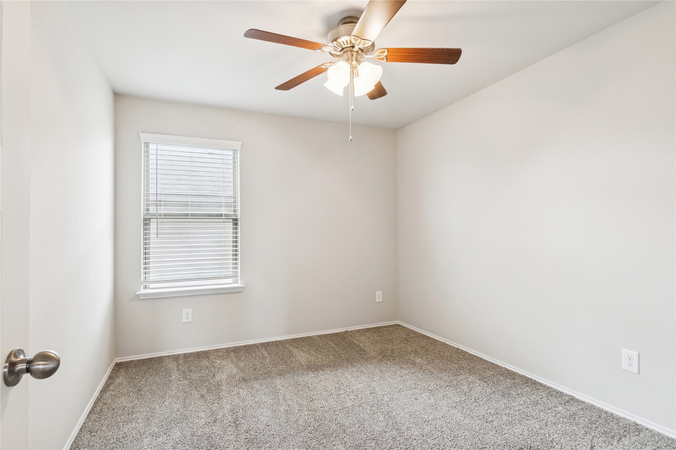 1603 Goose Island Lane Rosenberg, TX 77469 - Photo 21 of 26 an empty room with windows and fan