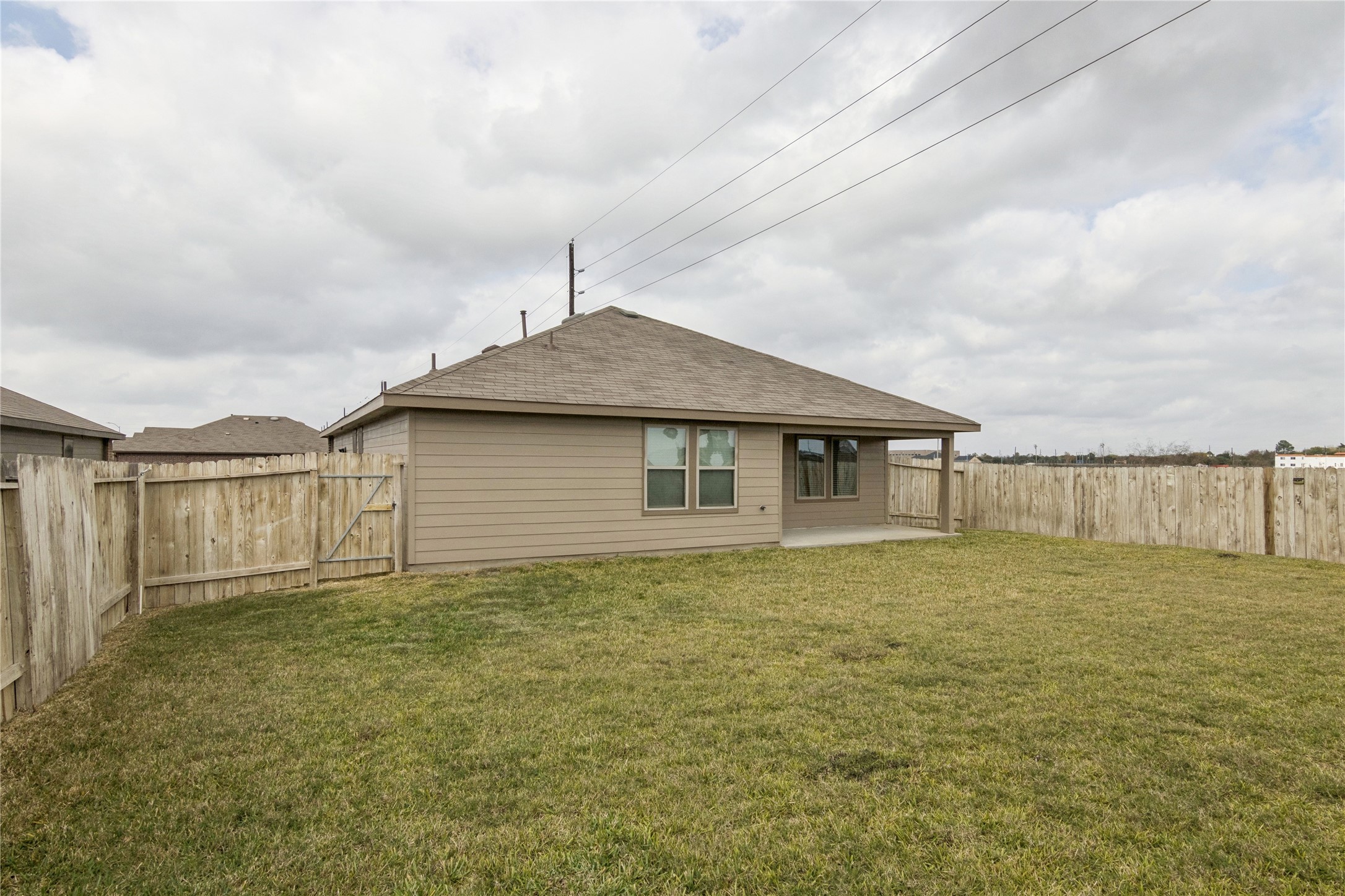 1603 Goose Island Lane Rosenberg, TX 77469 - Photo 26 of 26 a backyard of a house