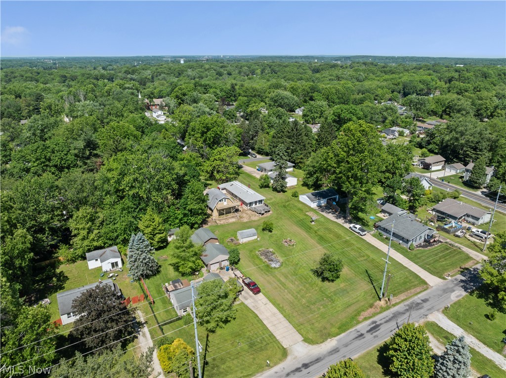 409 Edith Avenue Akron, OH 44312 - Photo 45 of 45 Expansive aerial perspective showcasing a residential area with mature tree coverage