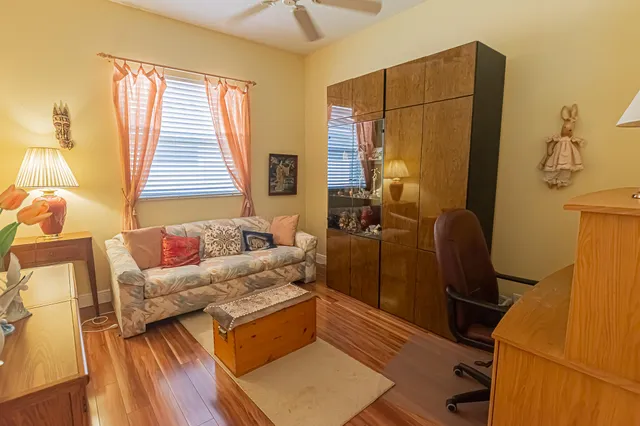 a living room with furniture and a window