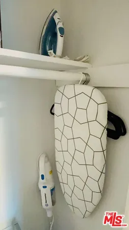 a bathroom with a sink and a stove