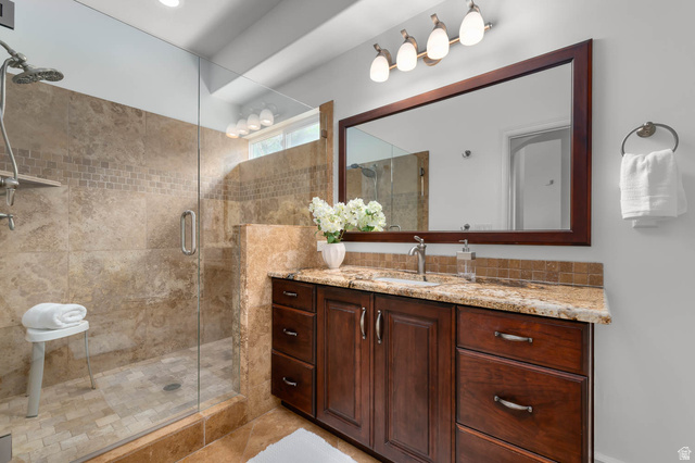 439 East 13540 South Draper, UT 84020 - Photo 23 of 46 Walk-in shower with natural stone tile surround and glass enclosure