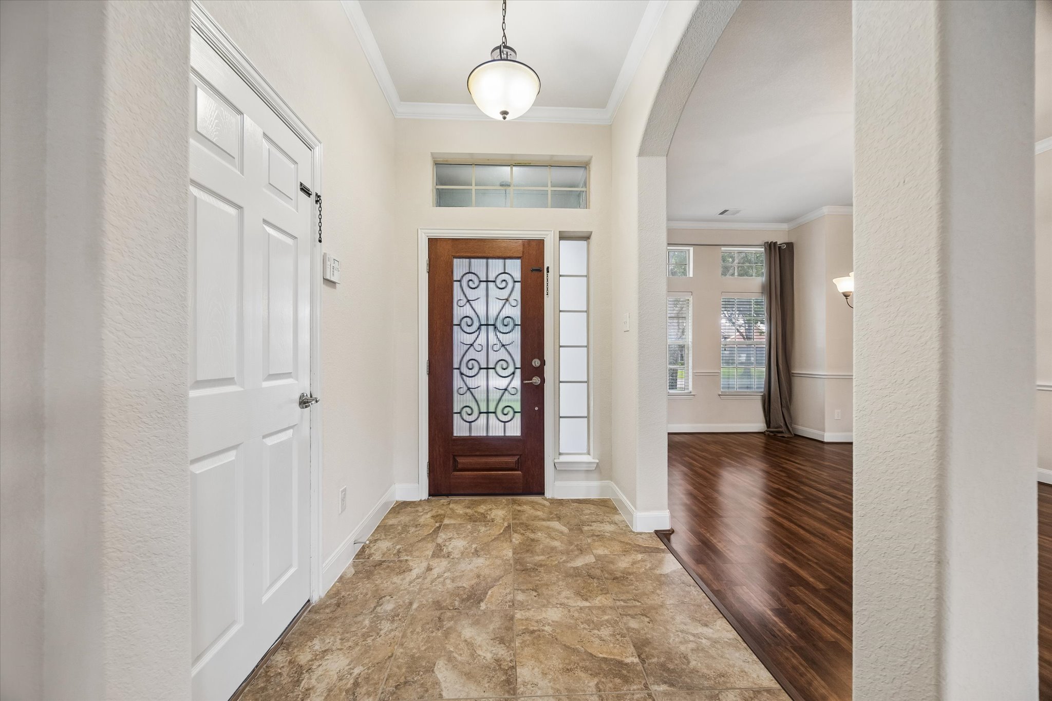 2214 Wembley Way Rosenberg, TX 77471 - Photo 8 of 35 Entryway featuring a decorative glass front door, transom window, and sidelight