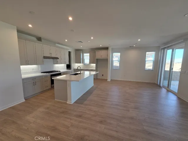 a large kitchen with cabinets