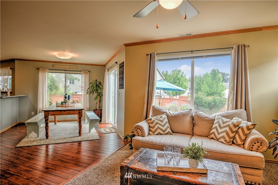 20398 Springbrook Road Southeast Monroe, WA 98272 - Photo 8 of 39 a living room with furniture and a window