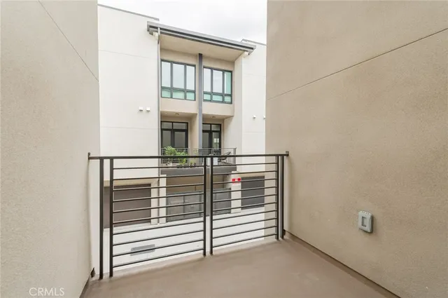 a view of a hardwood & staircase in a room