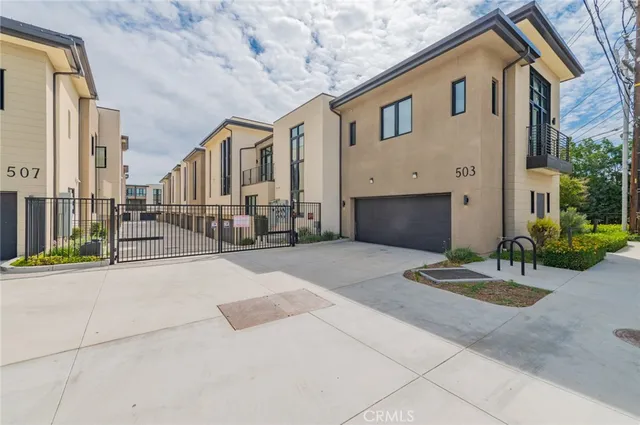 a front view of a house with yard