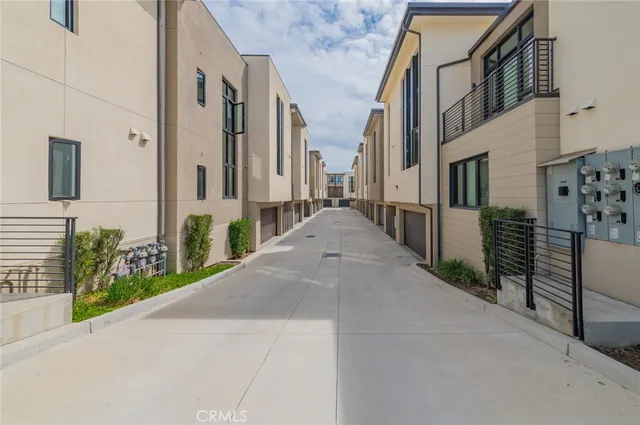 a view of a house with a street