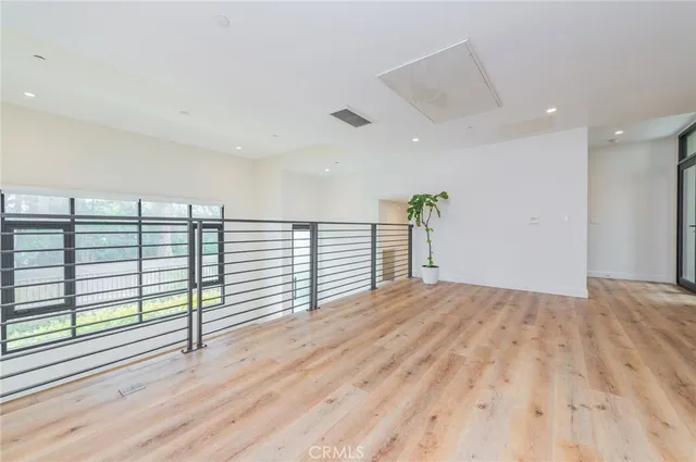a view of a room with a large window