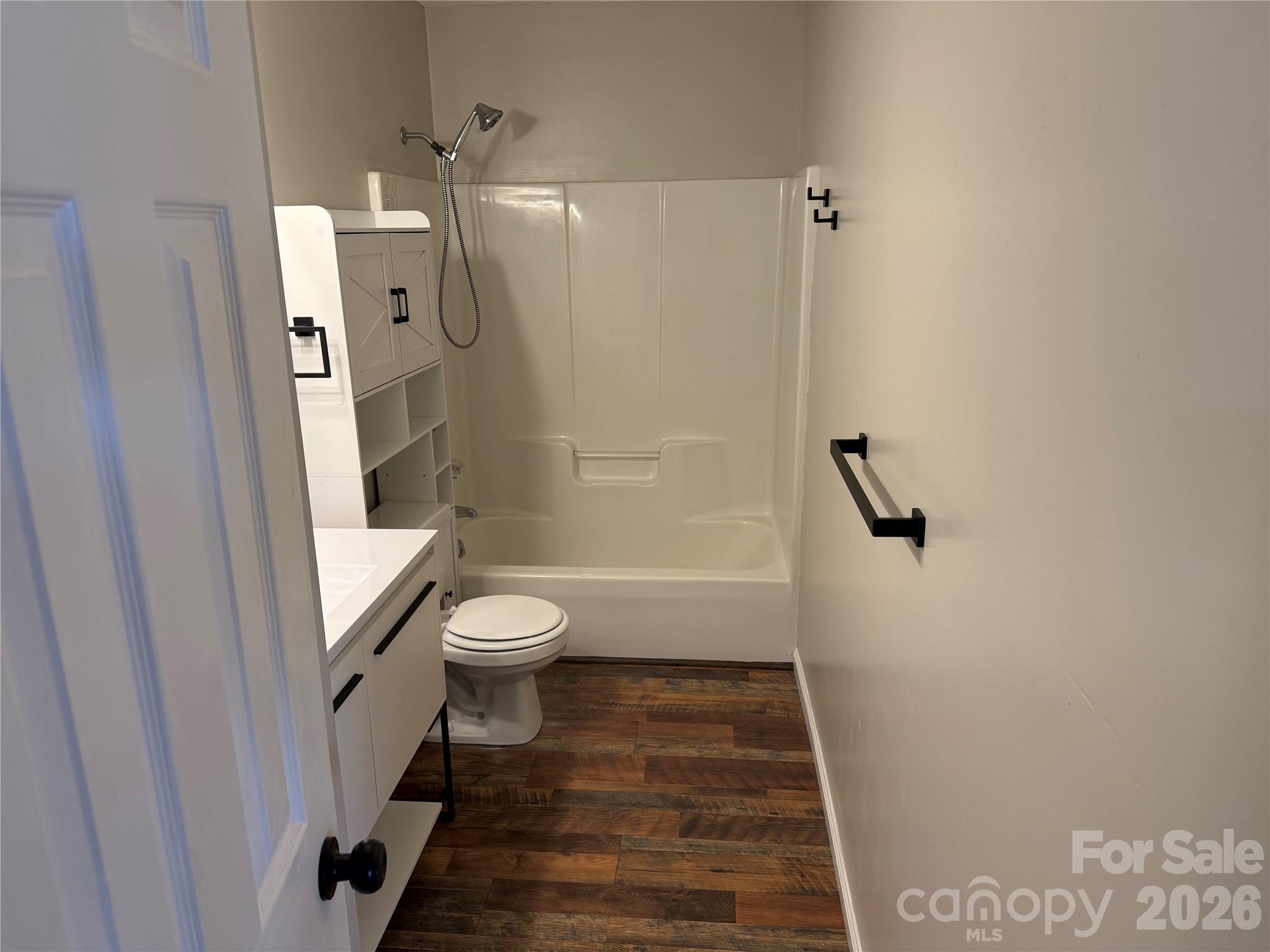 628 Hidden View Loop Marion, NC 28752 - Photo 16 of 44 a bathroom with a toilet and a shower