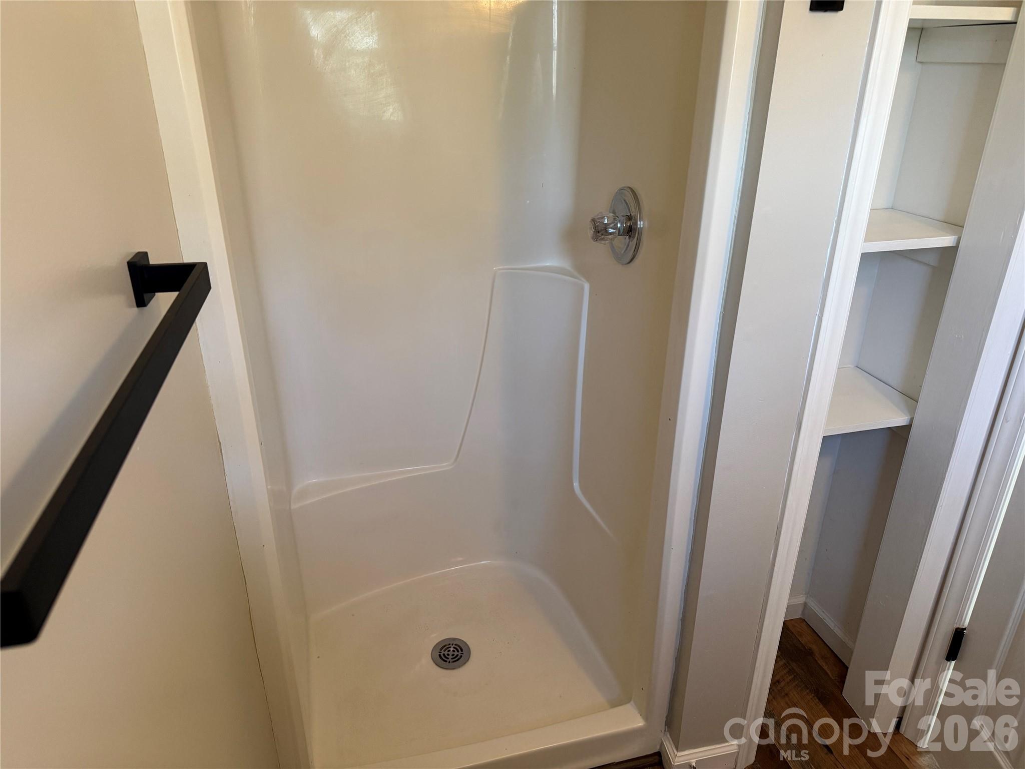 628 Hidden View Loop Marion, NC 28752 - Photo 23 of 44 a bathroom with a shower