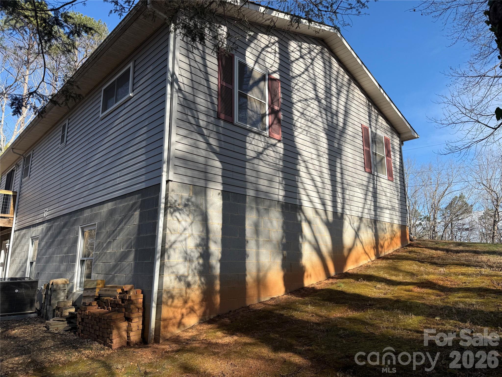 628 Hidden View Loop Marion, NC 28752 - Photo 40 of 44 a view of a house with a backyard